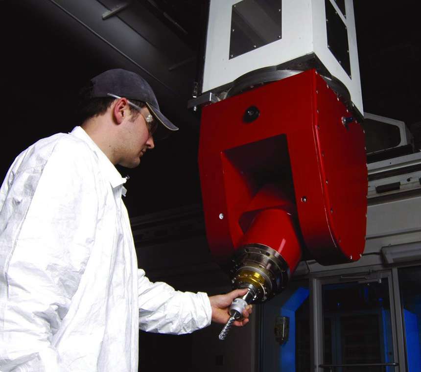 Man checking on equipment