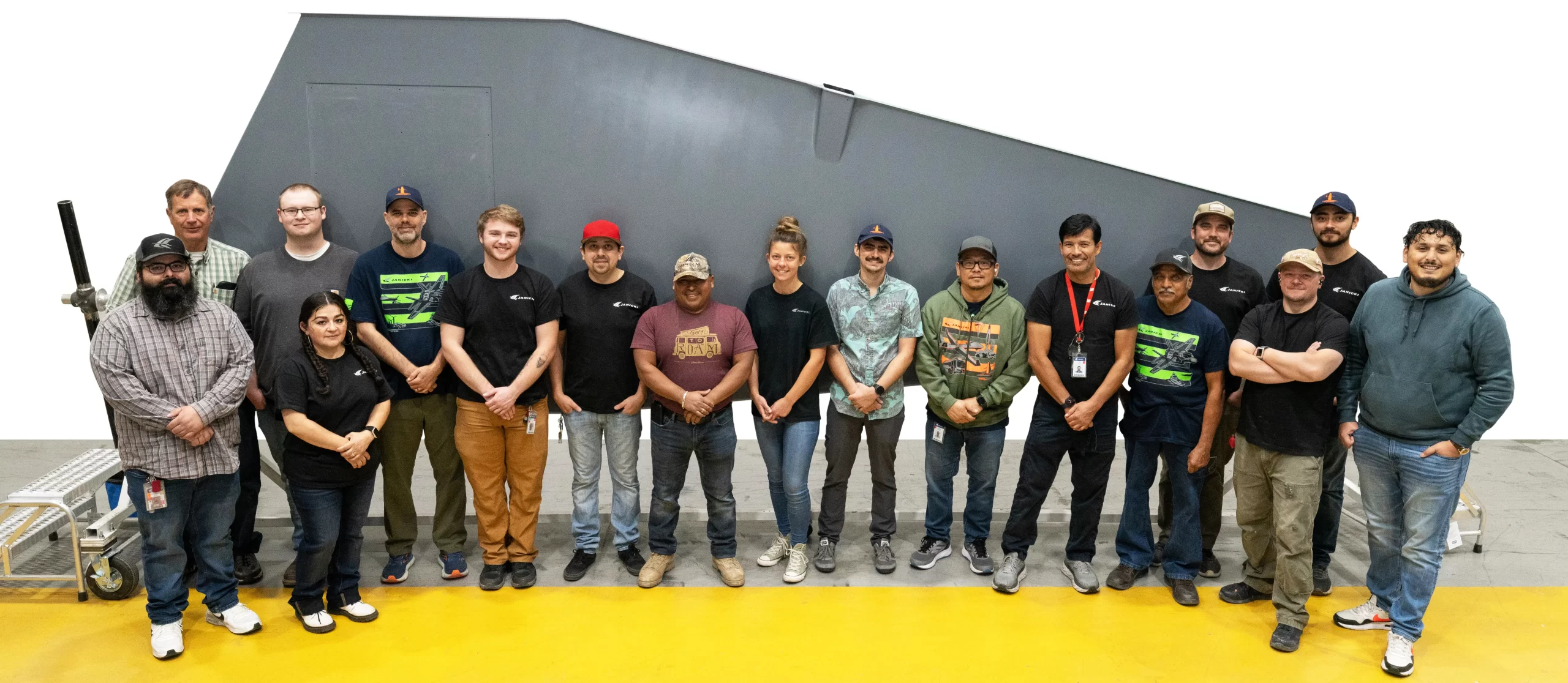 Group Photo in front of Composite Wing