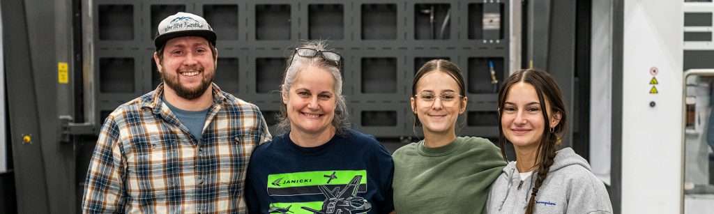 Angie and family smiling