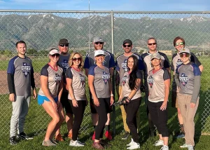 Our Utah employee coed softball team poses for a group photo
