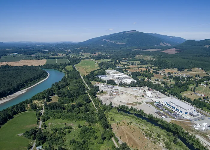 A drone photo of the Janicki Hamilton campus and the Skagit River valley