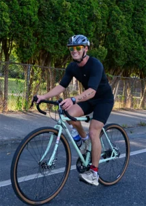 Luke, engineering intern, biking in a triathalon