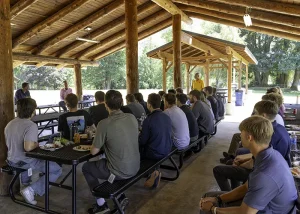 Executives speak with interns at the meet and greet