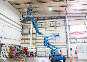 Joe on up on a lift to service HVAC systems