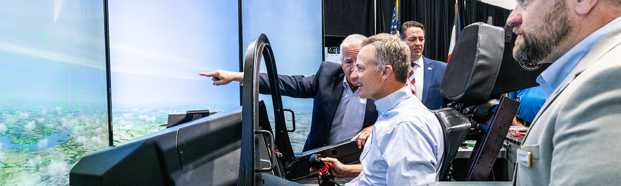 Representative Tim Moore piloting the F-35 simulator