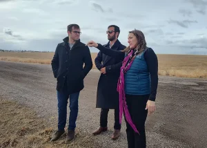 From left: Thomas Janicki, Michael Janicki, COO of Janicki, and Jolene Schalper, executive vice president of the Great Falls Development Alliance, tour the AgriTech Park site.
