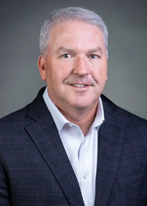 Headshot of Bob Devoe, Janicki Vice President of Contracts, Supply Chain and Government Compliance